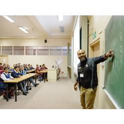 U.S. Military Academy math professor Samuel Ivy lectures South African students.