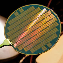 A wafer containing hundreds of computer chips made from carbon nanotubes.