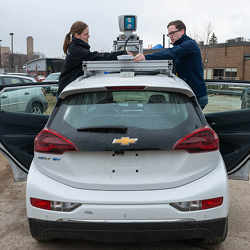 University of Toronto researchers working on a self-driving vehicle.