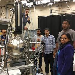 University of Central Florida assistant professor Madhab Neupane (in blue plaid shirt) with his team of student researchers.