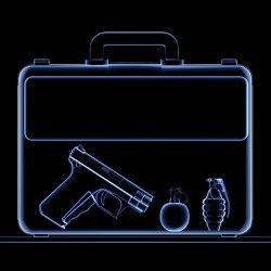 x-ray scan of luggage with gun and weaponry