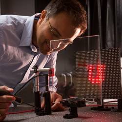 The University of Utah's Rajesh Menon demonstrating the lensless camera. 