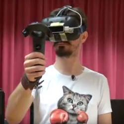 Computer science student Hugo Hueber demonstrates the virtual reality game.