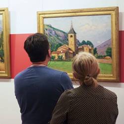 Visitors admire a painting in France's tienne Terrus Museum, where more than half of the paintings were found to be fakes.