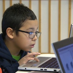 child at coding workshop in Iqaluit