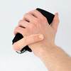 Smartphone With a Finger Crawls Across the Table to Stroke Your Wrist