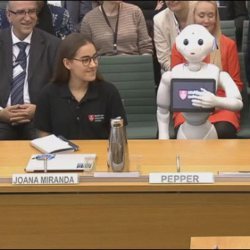 Pepper the robot before Parliament