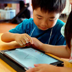 Yuri Kageyama, Associated Press file Children work on a digital program at Coby Preschool in Yoshikawa, Japan.