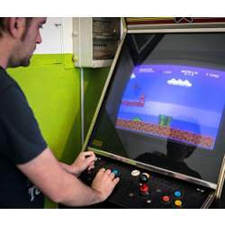 A gamer playing Super Mario.
