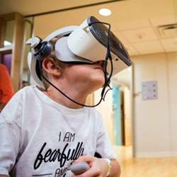 A child is prepared for an MRI test with the VR app.