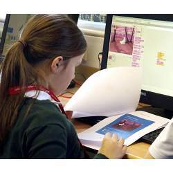 A U.K. student working with a computer.