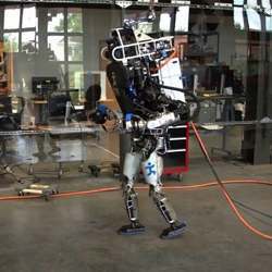 The Atlas robot walking with a more-natural gait.