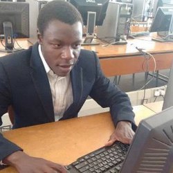 Bongani Jubani in the NUST computer lab