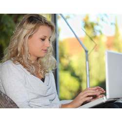 A woman taking an online course.