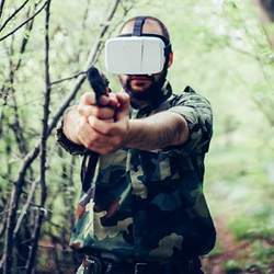 A soldier wears a virtual reality headset during a training exercise.
