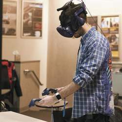 Using a virtual reality headset that simulates a radioactive spot test.