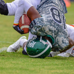 high school football player landing on his head