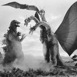 Japanese movie monsters Godzilla and Ghidra (namesake of the new NSA software) do battle.