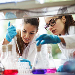 Young women in the midst of an experiment.