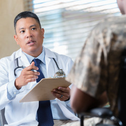 physician with veteran patient