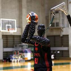 The robot prepares to sink a three-point shot.