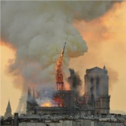 Notre Dame spire fire