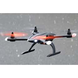 An aerial drone flying in the rain.