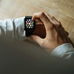 Man wearing a smartwatch.