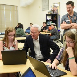 Arkansas Gov. Asa Hutchinson with computer science students 