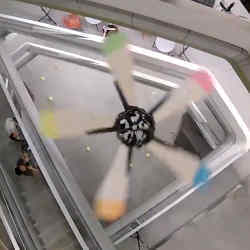 The drone flies in a stairwell during a test flight.