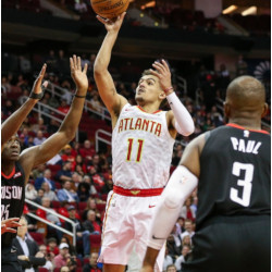 Trae Young taking a jump shot