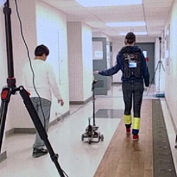 individual demonstrates Columbia's robotic cane