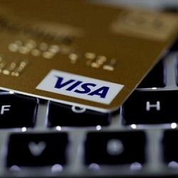 Visa credit card on keyboard