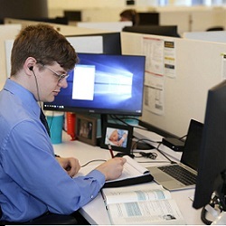 Ernst & Young's Justin Pierce at his desk