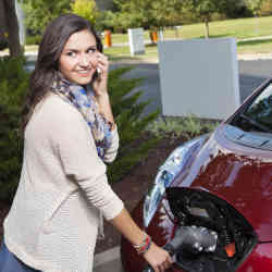 Charging a Nissan Leaf electric vehicle.