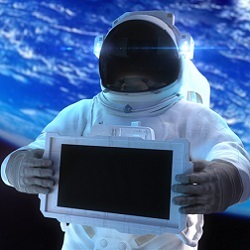 astronaut holding an electronic display