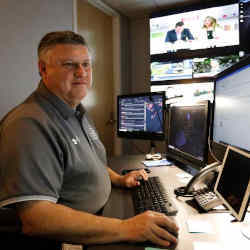 Paul Hildreth, emergency operations coordinator for the Fulton County School District, working in the emergency operations center at the Fulton County School District Administration Center in Atlanta, GA.