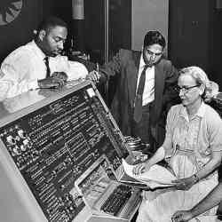 From left, programmers Donald Cropper, K.C. Krishnan, and Grace Hopper at the console of Univac I. Not shown: Norman Rothberg.