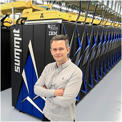 ORNL's Gaute Hagen with the Summit supercomputer