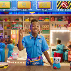 A child actor encourages visitors to make a choice in the virtual store KidHQ.