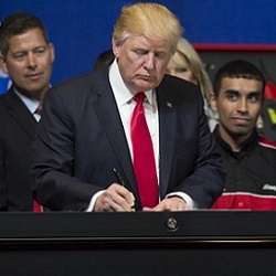 President Trump signing the 'Buy American and Hire American' executive order