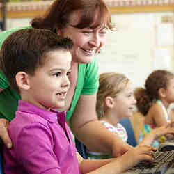 Children learning computer literacy.