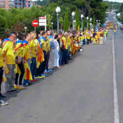 The September 2013 Catalan Way, in which 1.2 million people  many clad in yellow shirts and blue scarves  linked arms to support Catalan independence from Spain