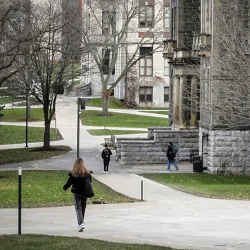 students walking on Syracuse University campus