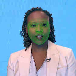 A green wireframe covers a woman's lower face during the creation of a synthetic facial reanimation video, also known as a deepfake. 
