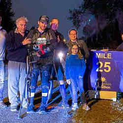 Adam Gorlitsky (second from left) and well-wishers at the 25-mile marker.