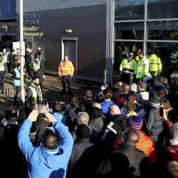 U.K. soccer fans protest the use of facial recognition technology outside the Cardiff City soccer stadium earlier this month.