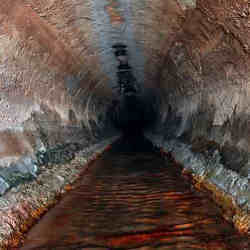 A view of a sewer pipe from the inside. 