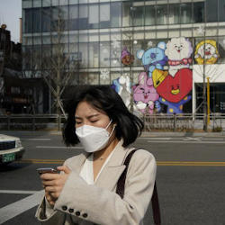 A South Korean Woman Wearing a Mask