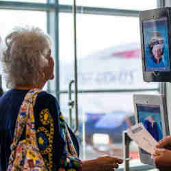 A woman sees her facial recognition scan.